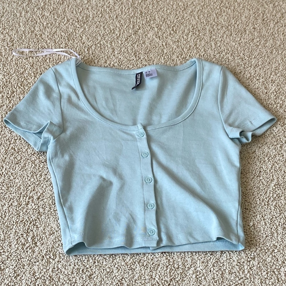 Light blue top